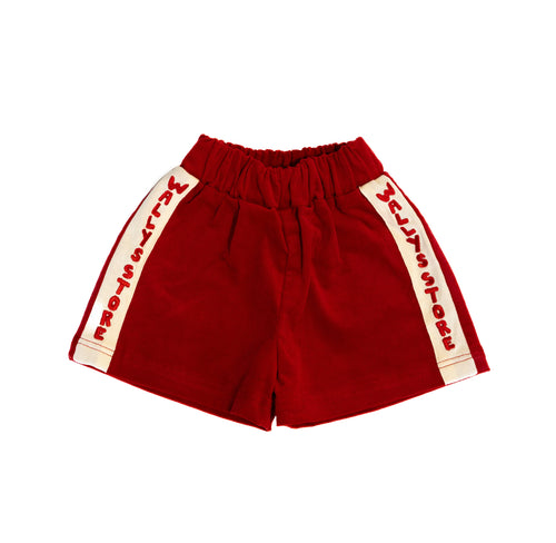 Red kids organic shorts with white stripes featuring text on a white background from Wallys Store